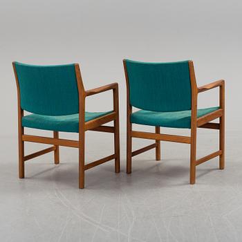 KARL ERIK EKSELIUS, a pair of teak armchairs from JOC Möbler, Vetlanda.