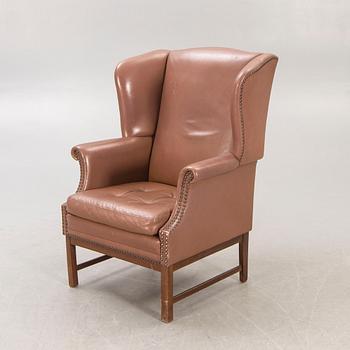 A 1960s leather armchair.