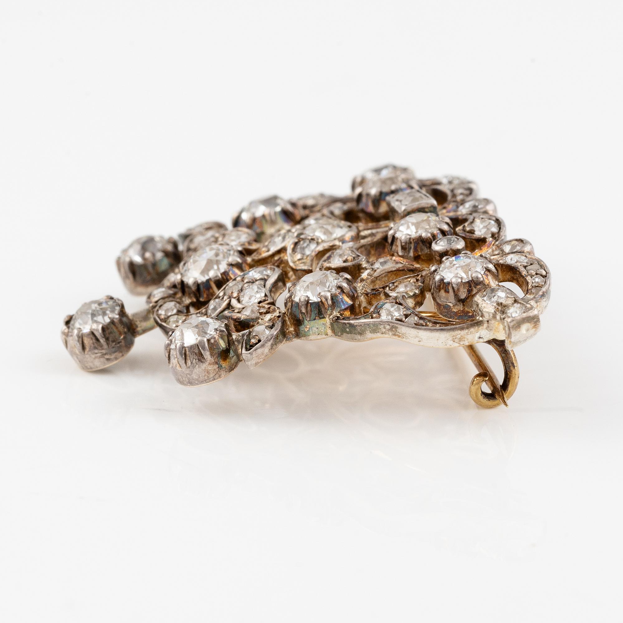 Tiara/brosch/collier, silver med gammalslipade och rosenslipade diamanter.