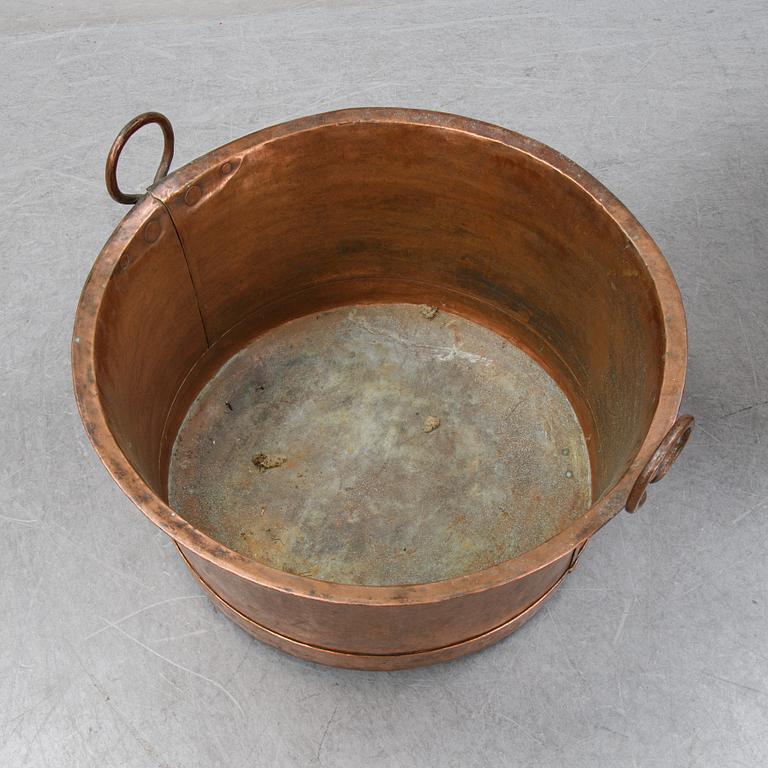 An 19th Century copper cauldron.