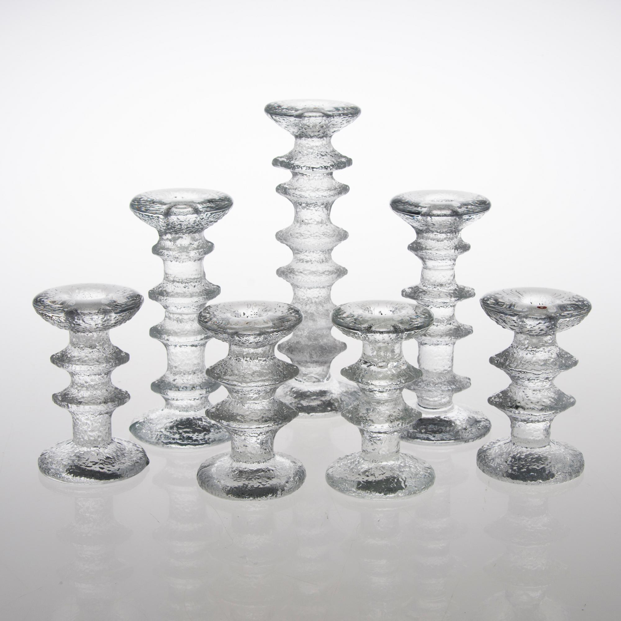 TIMO SARPANEVA, SEVEN FESTIVO GLASS CANDLESTICKS, Iittala, partly signed TS.