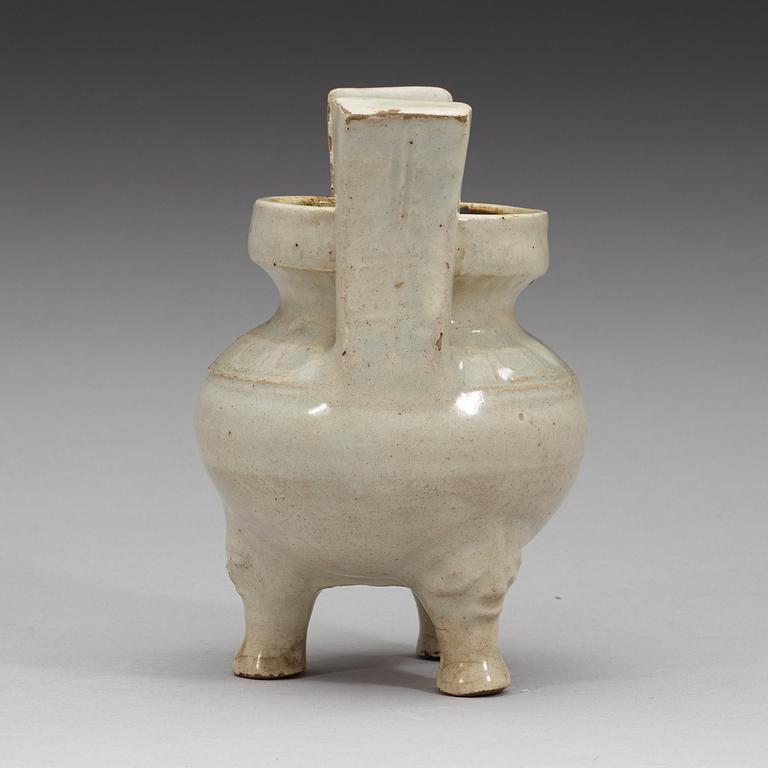 A pale grey-bluish glazed tripod censer with decor in relief, and archaistic mark, Ming dynasty (1368-1644).