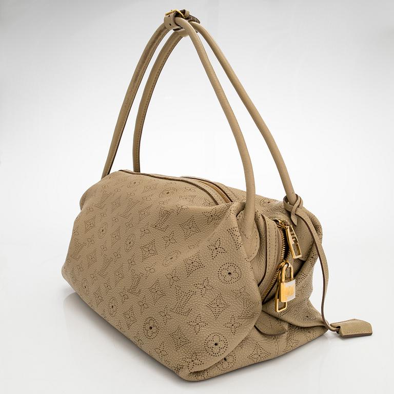 Louis Vuitton, a 'Mahina Galatea MM' bag.