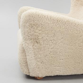 A pair of Danish Modern sheepskin armchairs, 1930's/40's.