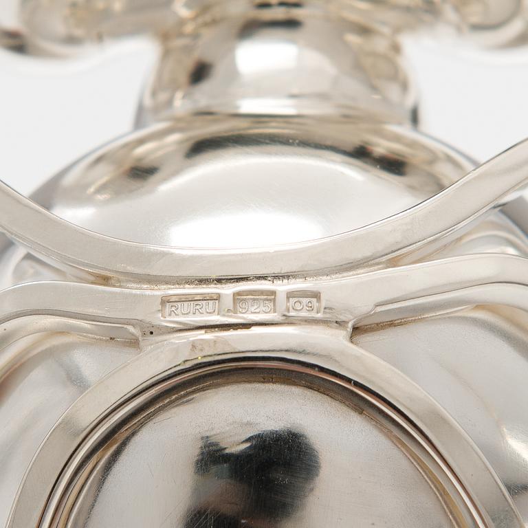 A sterling silver and glass oil decanter. Ru Runeberg 2015.