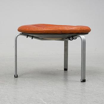 a "PK-33" tan leather stool, edition E Kold Christensen, Denmark.