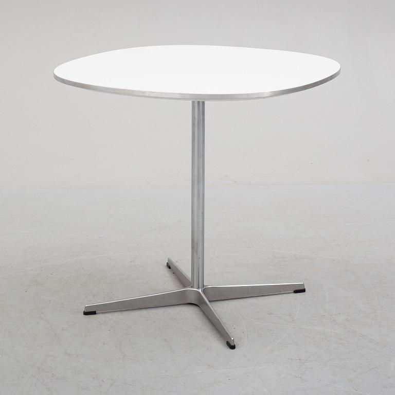 A 'Supercirkel' table by Bruno Mathsson & Piet Hein, Denmark, 1978.