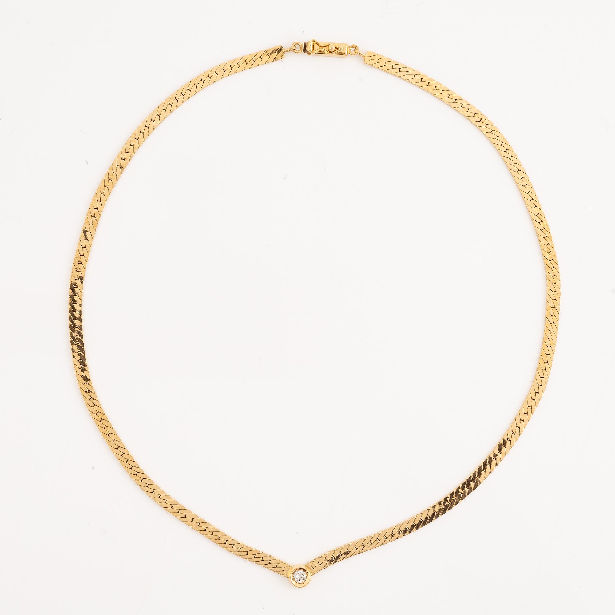 Necklace 18K gold with a round brilliant-cut diamond.