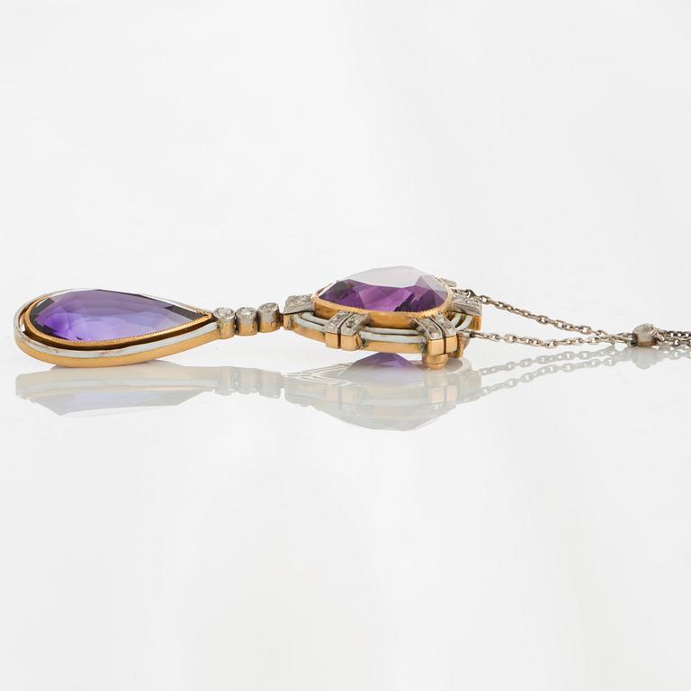 A pendant set with amethysts and rose-cut diamonds.