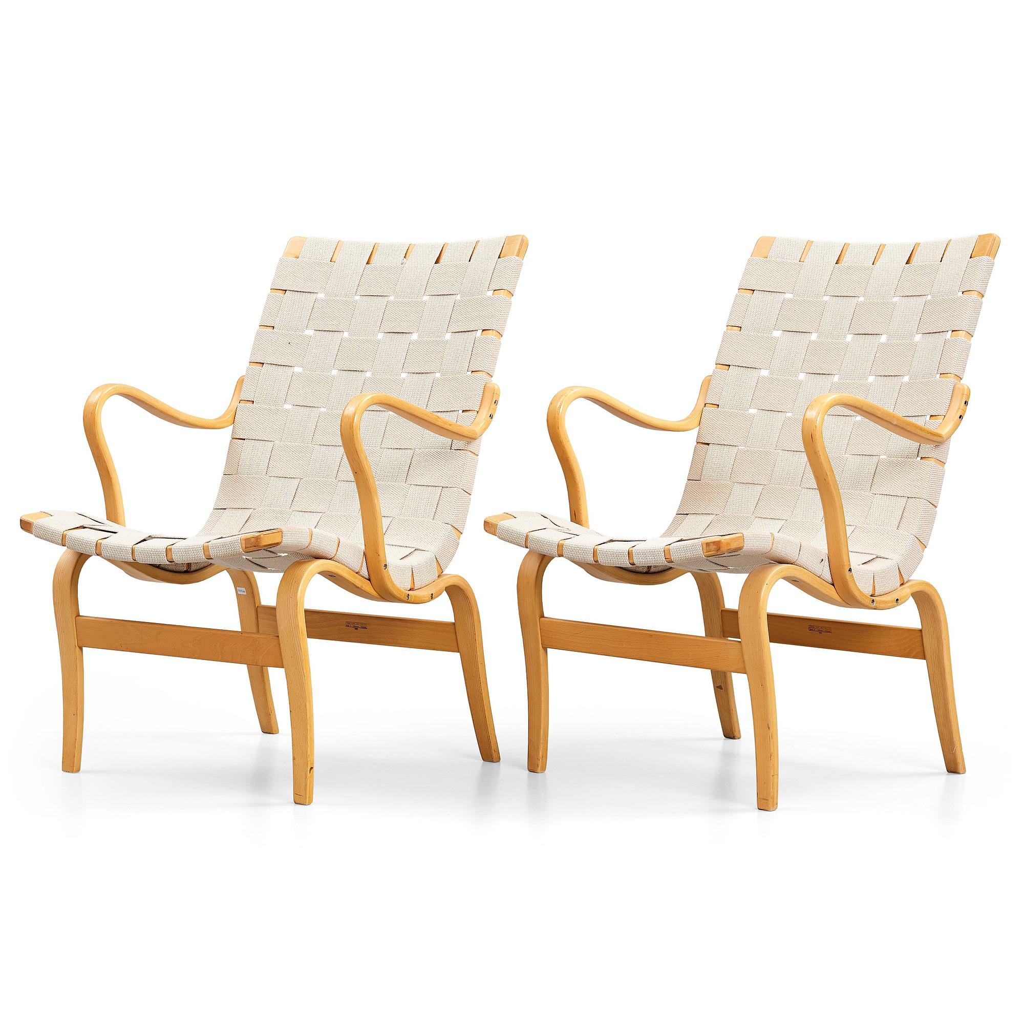 Bruno Mathsson, a pair of bent beech wood and textile girths 'Eva' lounge chairs, Firma Karl Mathsson, Sweden 1967.