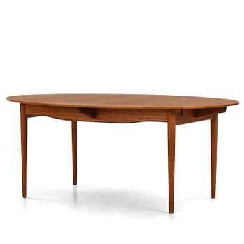 348. Finn Juhl, a teak dining table, Niels Vodder, Denmark, 1960s.