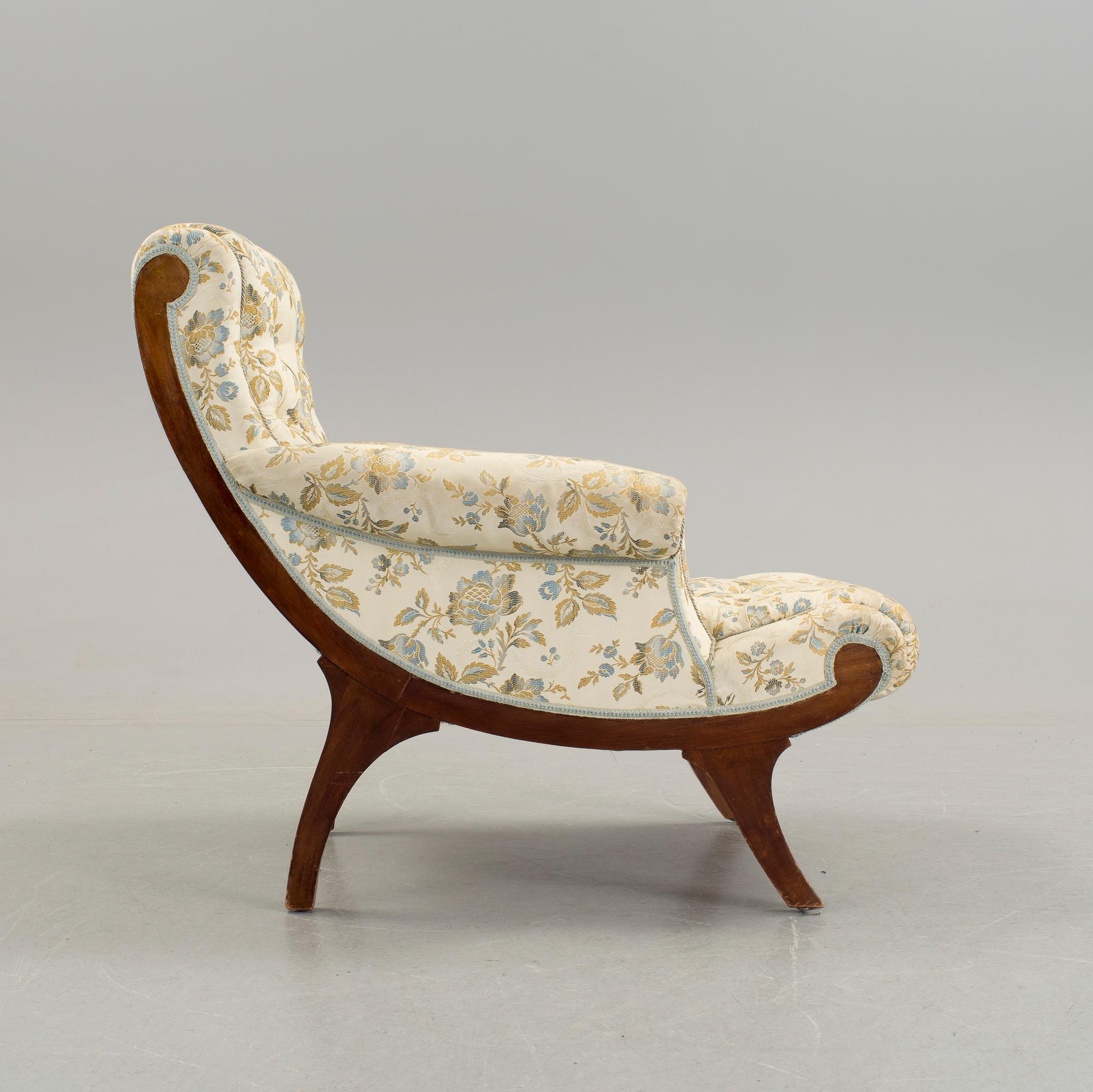 A mahongany recliner chair in the style of Adolf Loos, c. 1900. - Bukowskis