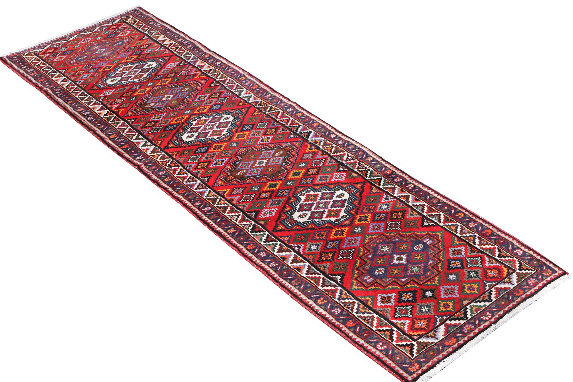 A runner carpet, Hamadan, c. 335 x 86 cm.