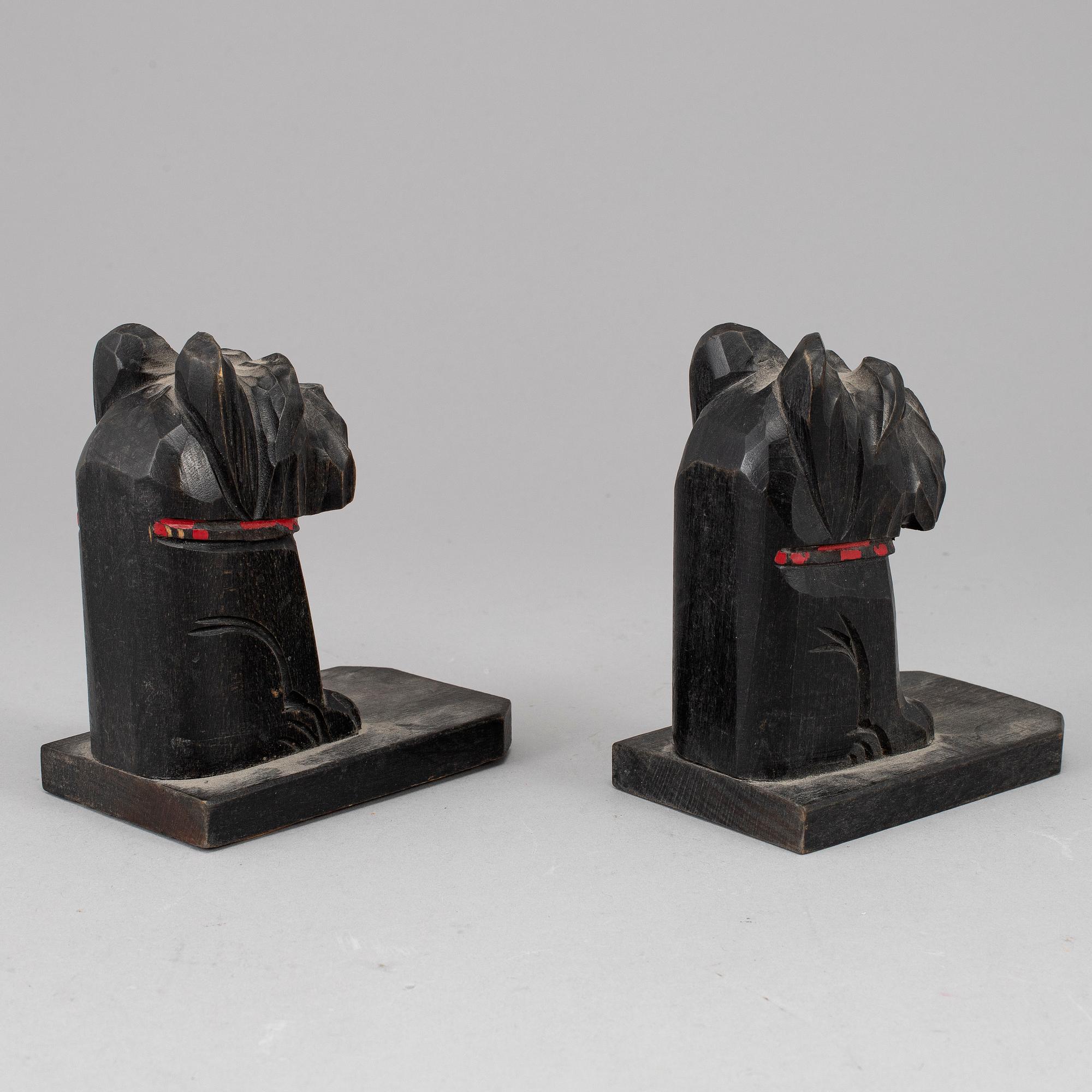 A pair of dark wood book stands, fiirst half of the 20th century.