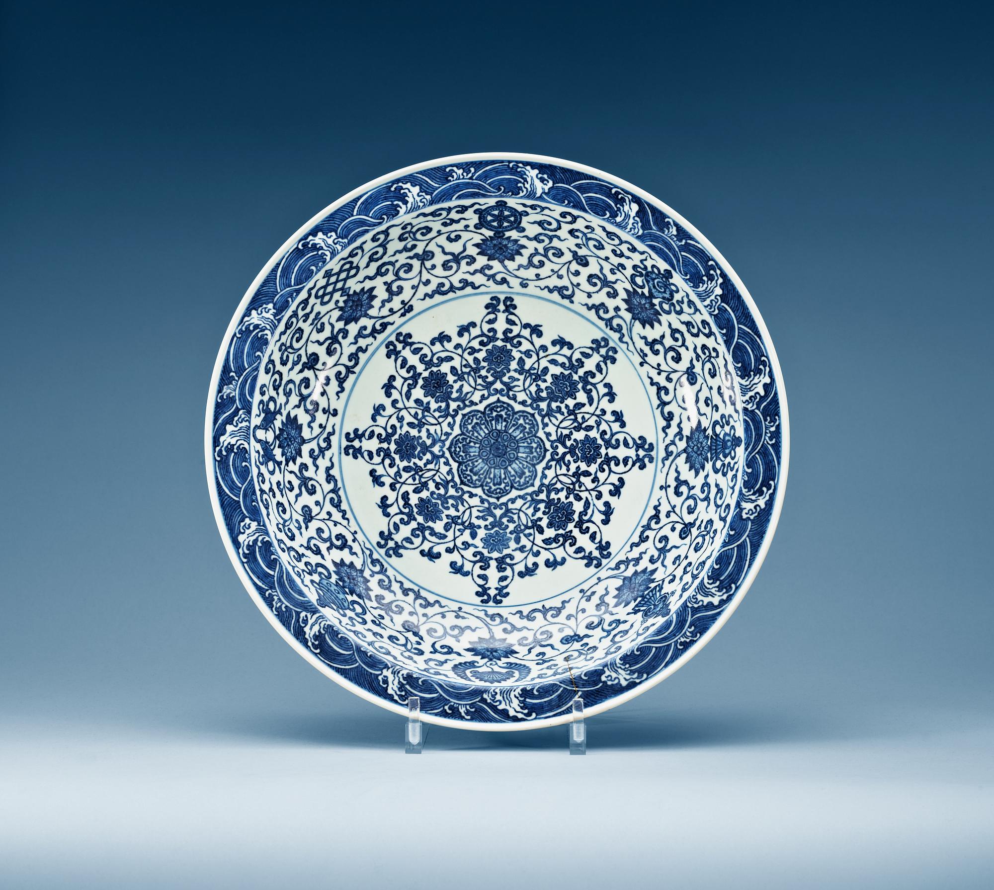 A large blue and white charger, Qing dynasty with Yongzheng six character mark.
