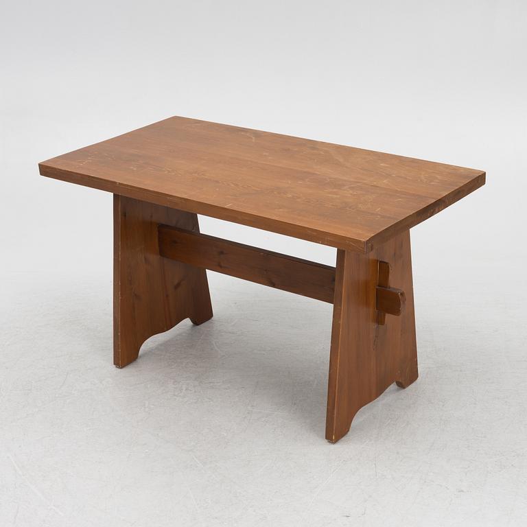 A pine dining table with a bench and two Göran Malmvall chairs, mid 20th century.
