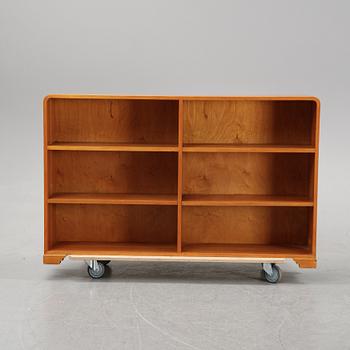 A mid 20th Century elm wood book case.