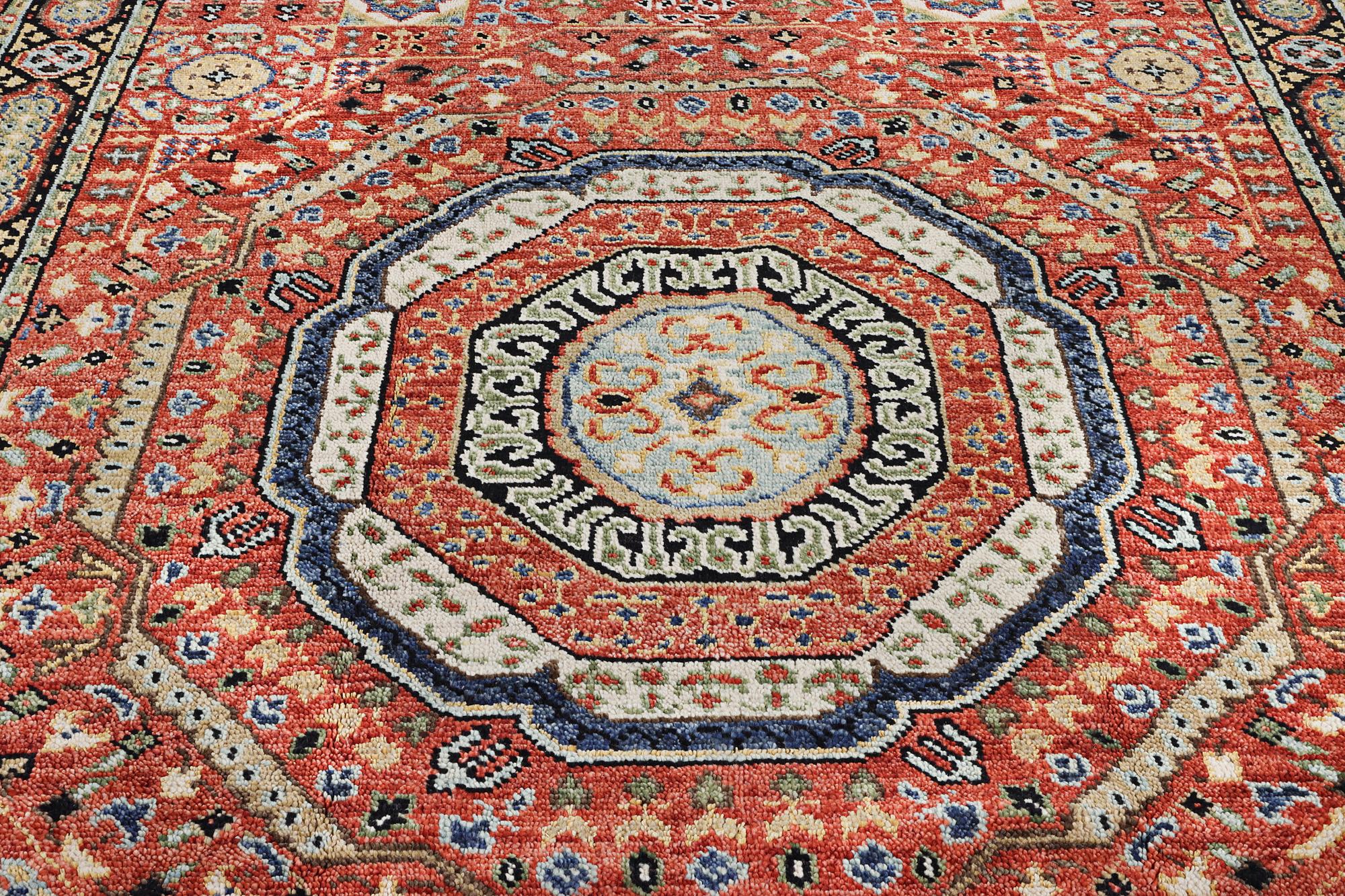 A carpet of Mamluk design, c. 307 x 243 cm.