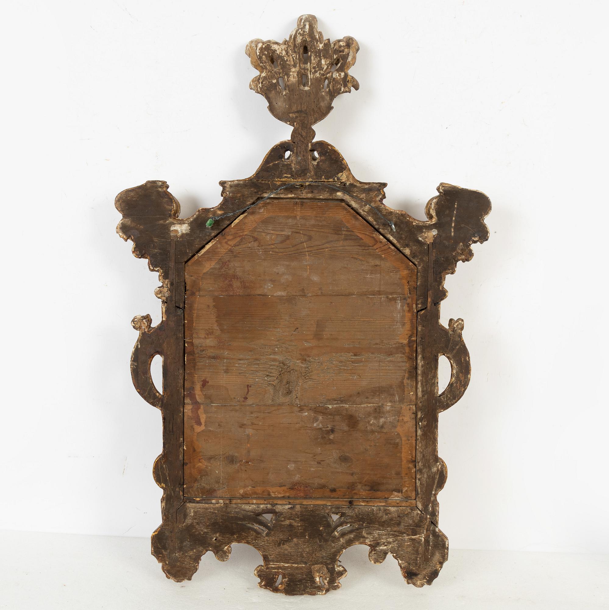 A Baroque mirror, Italy, first half of the 18th Century.