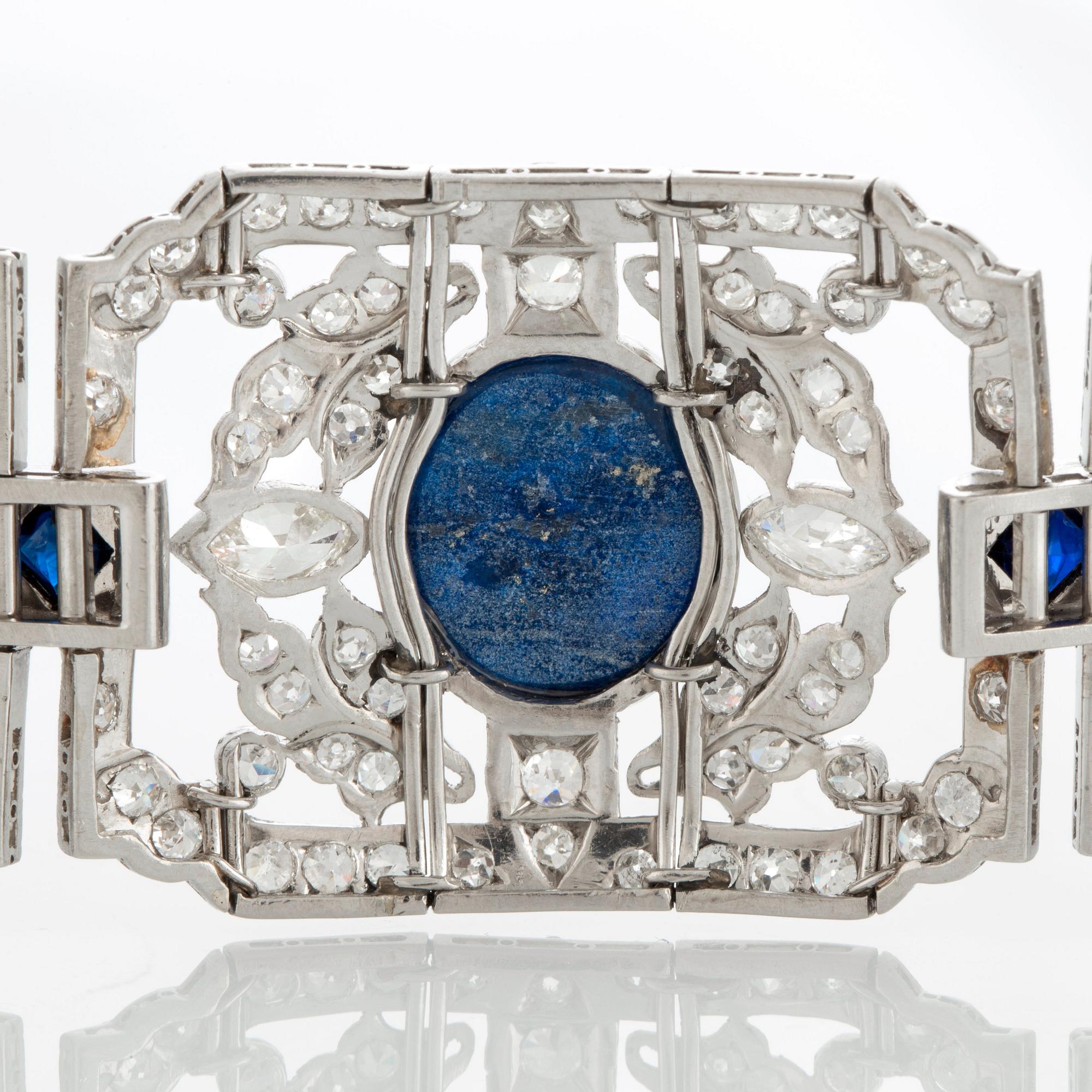 A platinum bracelet set with lapis lazuli, old-cut diamonds with a total weight of ca 10 cts and synthetic sapphires.