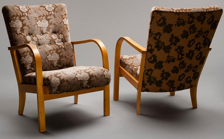 Ilmari Tapiovaara, A PAIR OF EASY CHAIRS. Ilmari Tapiovaara. Asko 1938.