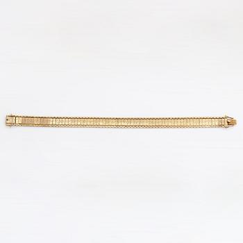 A 14k gold bracelet. Import marked Oskar Lindroos, Helsinki 1928.