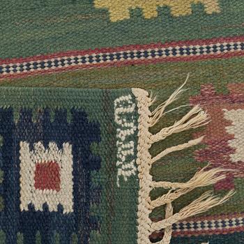 A CARPET, "Grön äng", flat weave, ca 291 x 197 cm, signed AB MMF.