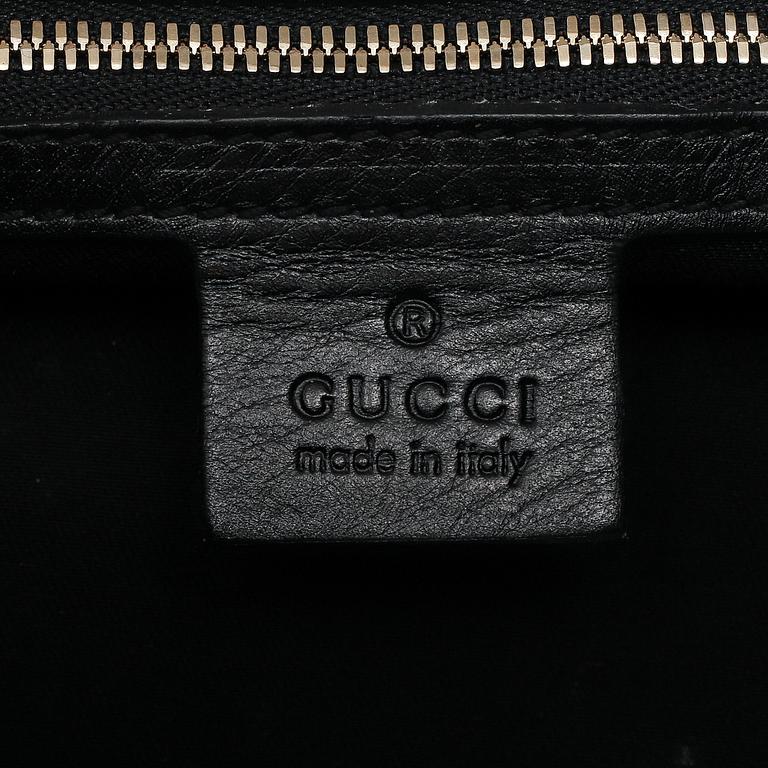 GUCCI, 'GG Canvas Horsebit Wave Handbag'.