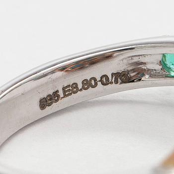 A 14K gold ring with emeralds. IGI certificate.
