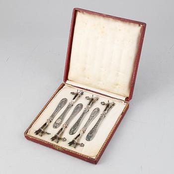 A set of six French 19th century silver bone-holders.