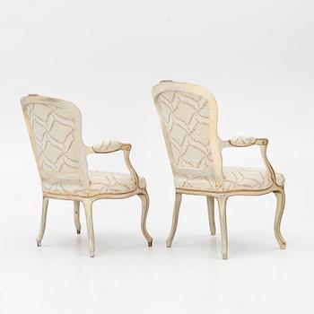 A matched pair of Rococo armchairs, 18th Century.