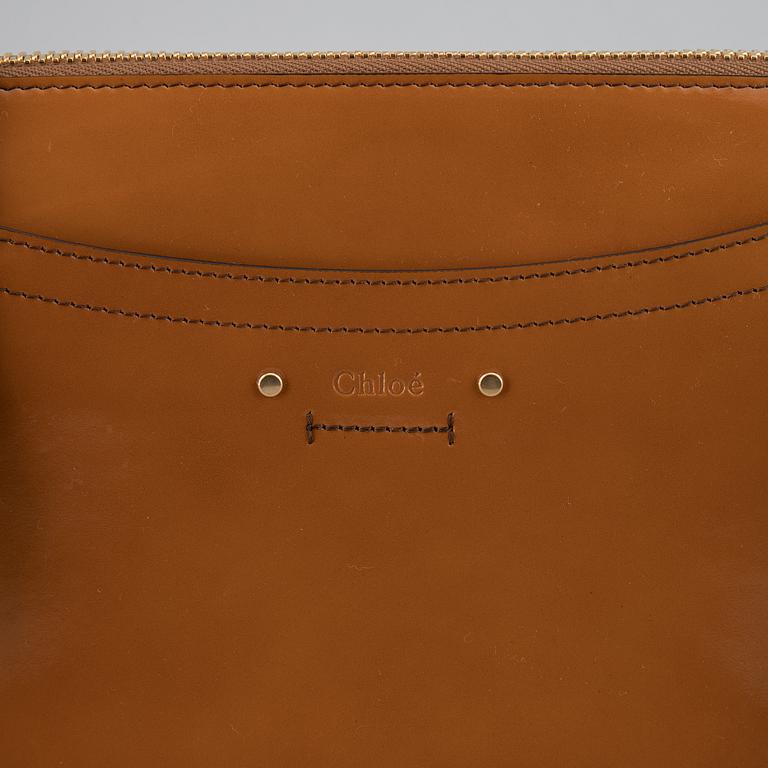 CHLOÉ, a small caramel 'Roy bag'.