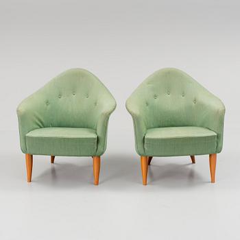 A pair of "Lilla Adam" armchairs by Kerstin Hörlin-Holmquist för Nordiska Kompaniet.