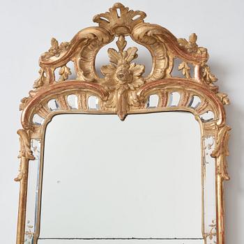 A Swedish Rococo mid 18th century rococo mirror in the manner of Ehrhart Göbel (1690-1764).