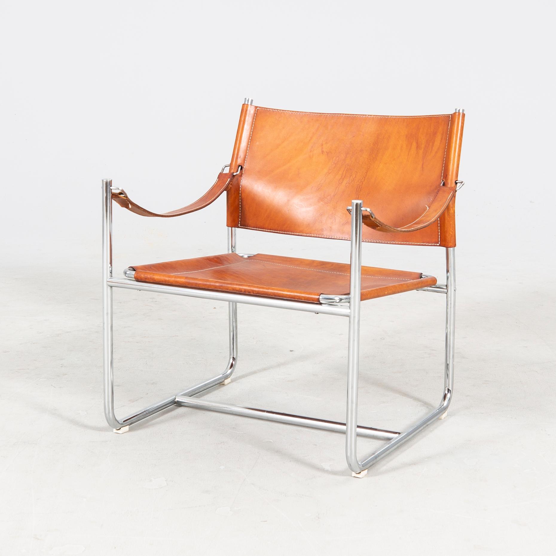 Karin Mobring, a late 20th century chrome and leather armchair from IKEA.