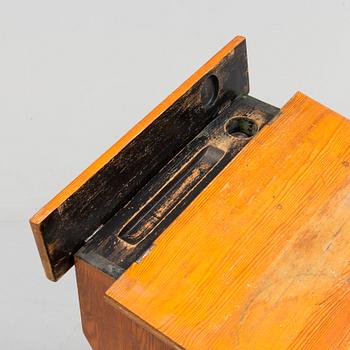 A first half of the 20th century school bench.