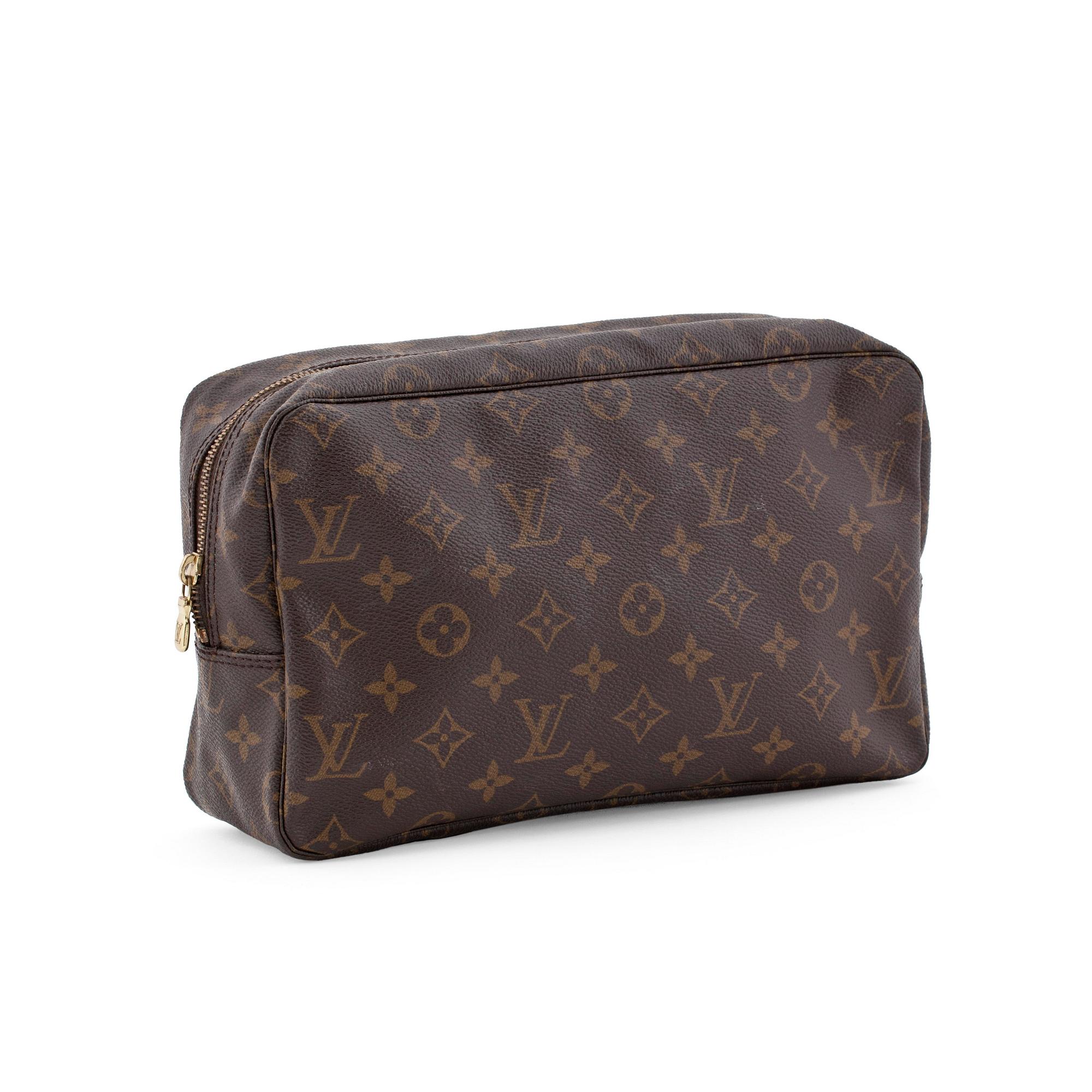 LOUIS VUITTON, a monogram canvas toiletry case.
