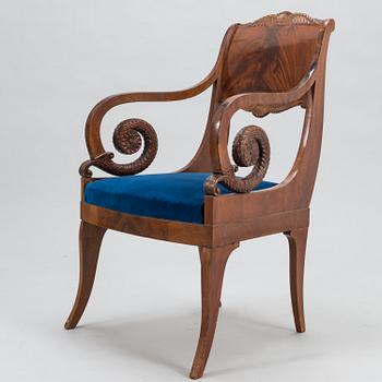 A 1820's-1840's Russian armchair in Late Empire style.