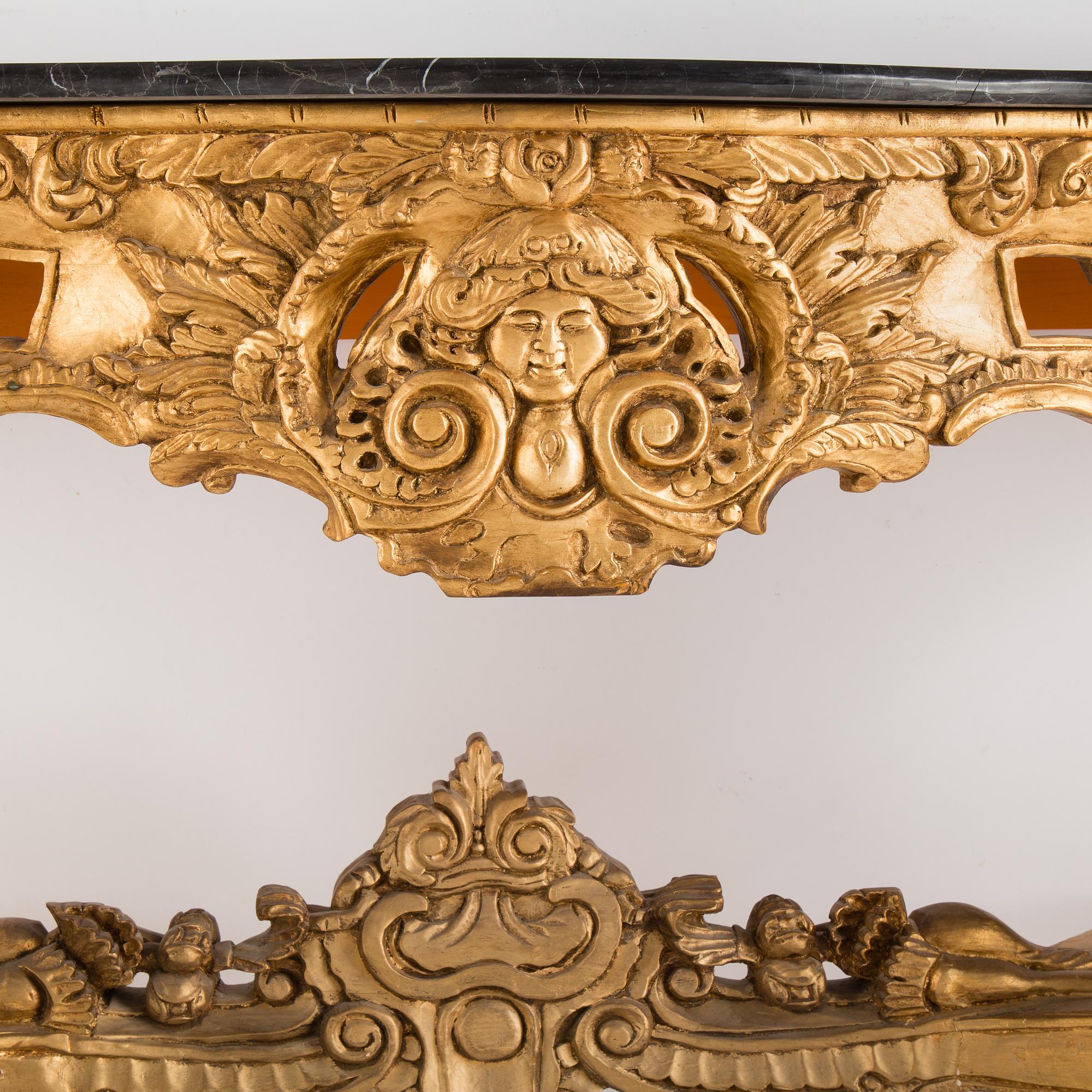 A later part of the 20th century mirror and consol table.