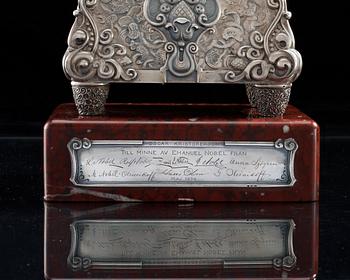 A RARE SILVER FABERGÉ CLOCK, Moscow 1908-1917. Imperial Warrant and scratched inventory no 17689.