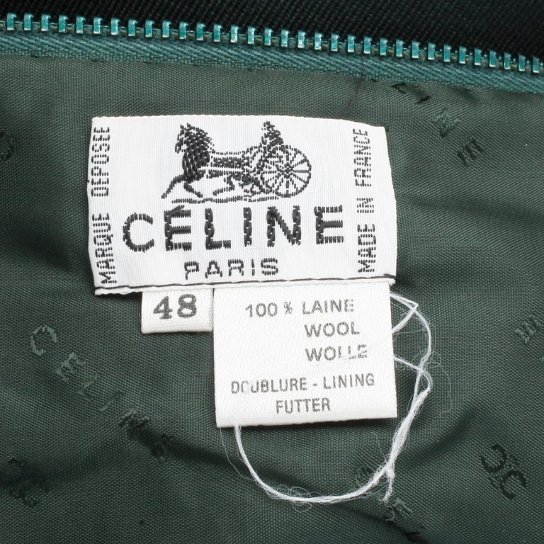 CÉLINE, a green wool skirt, size 48.