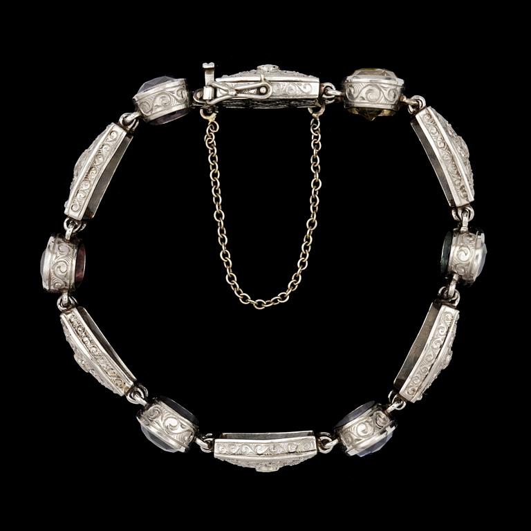 A colured stone and diamond bracelet, first half 20th century.