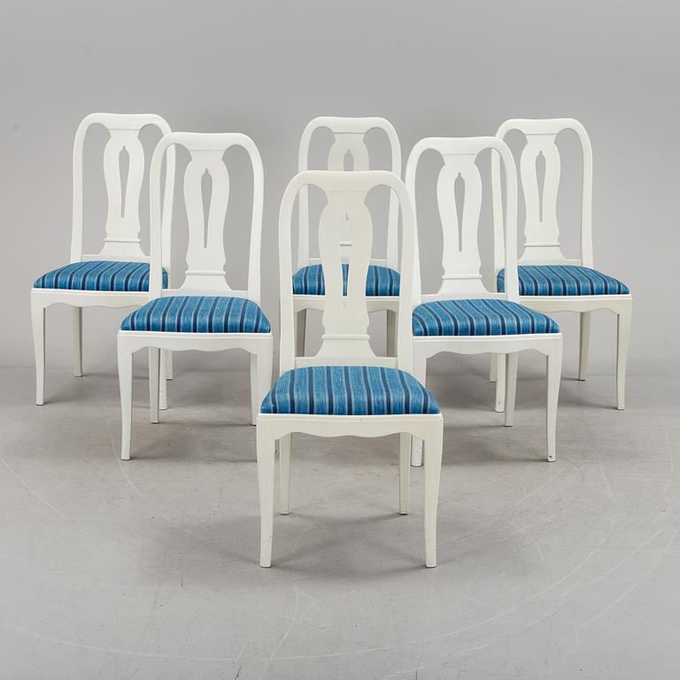 A seven piece dining grup by Carl Malmsten.