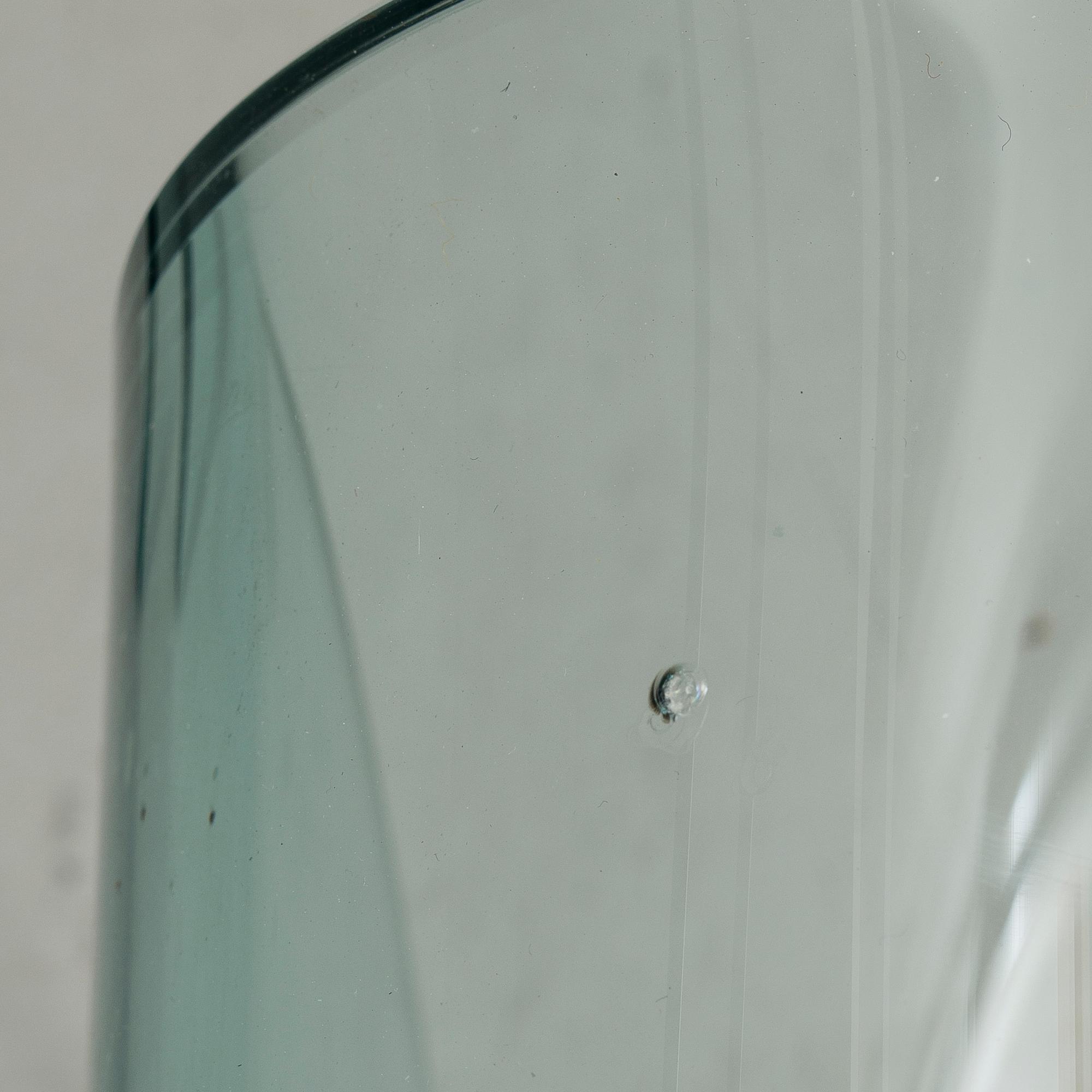 A GLASS NEST TABLE / GLASS COFFEE TABLE, "Eclipse" Ligne Roset, retailer Skanno Finland late 20th century.