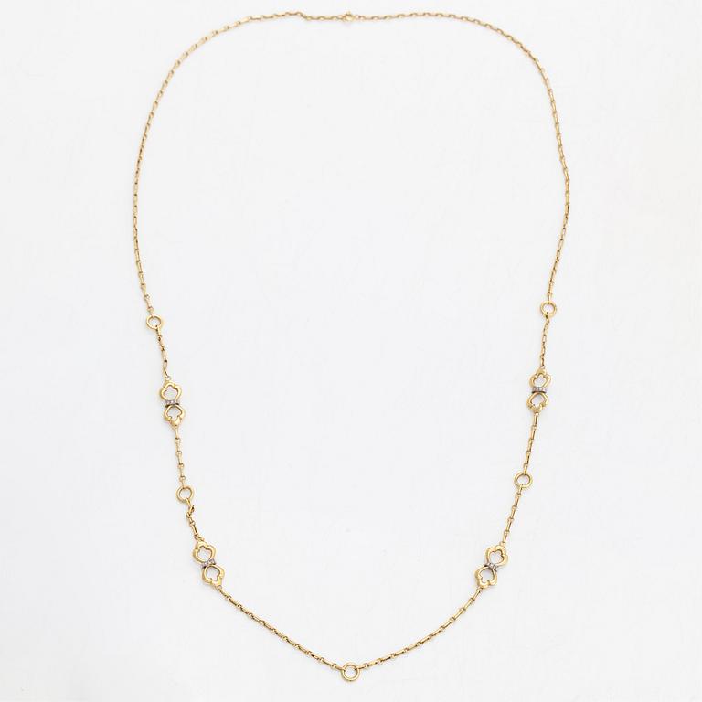 An 18K gold necklace, with diamonds totalling approx. 0.12 ct. Foreign hallmarks.