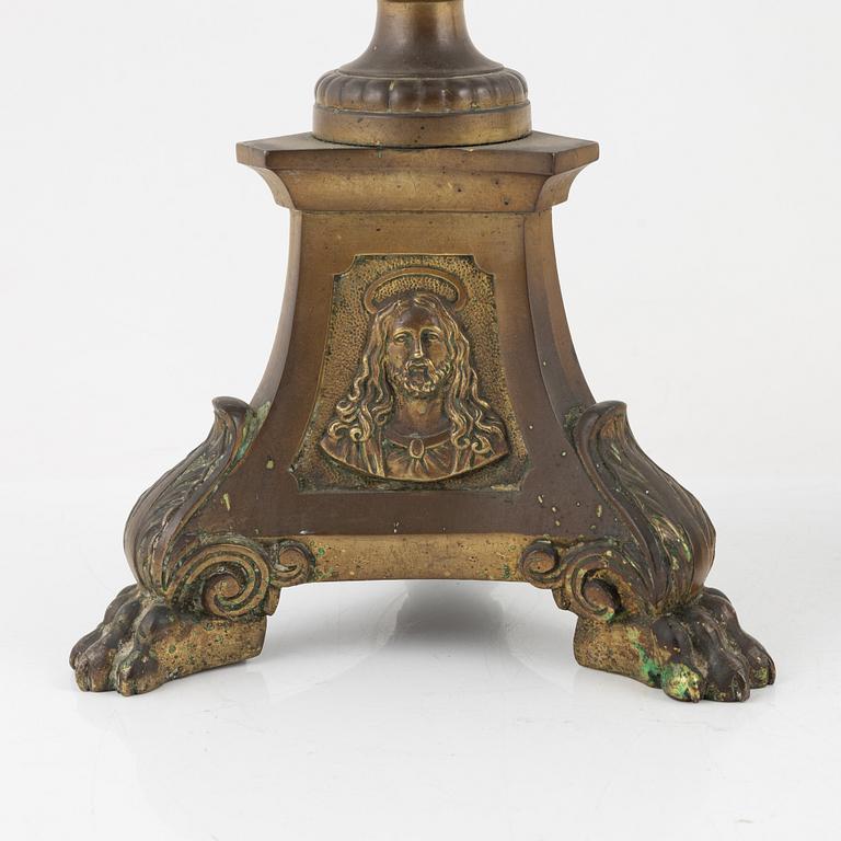 A pair of Baroque style brass altar candleholders, circa 1900.