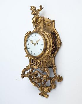 A Rococo mid 18th century cartel clock.