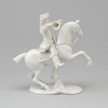 A white glazed Nymphenburg porcelain figure of a huntsman, Germany 20th Century.