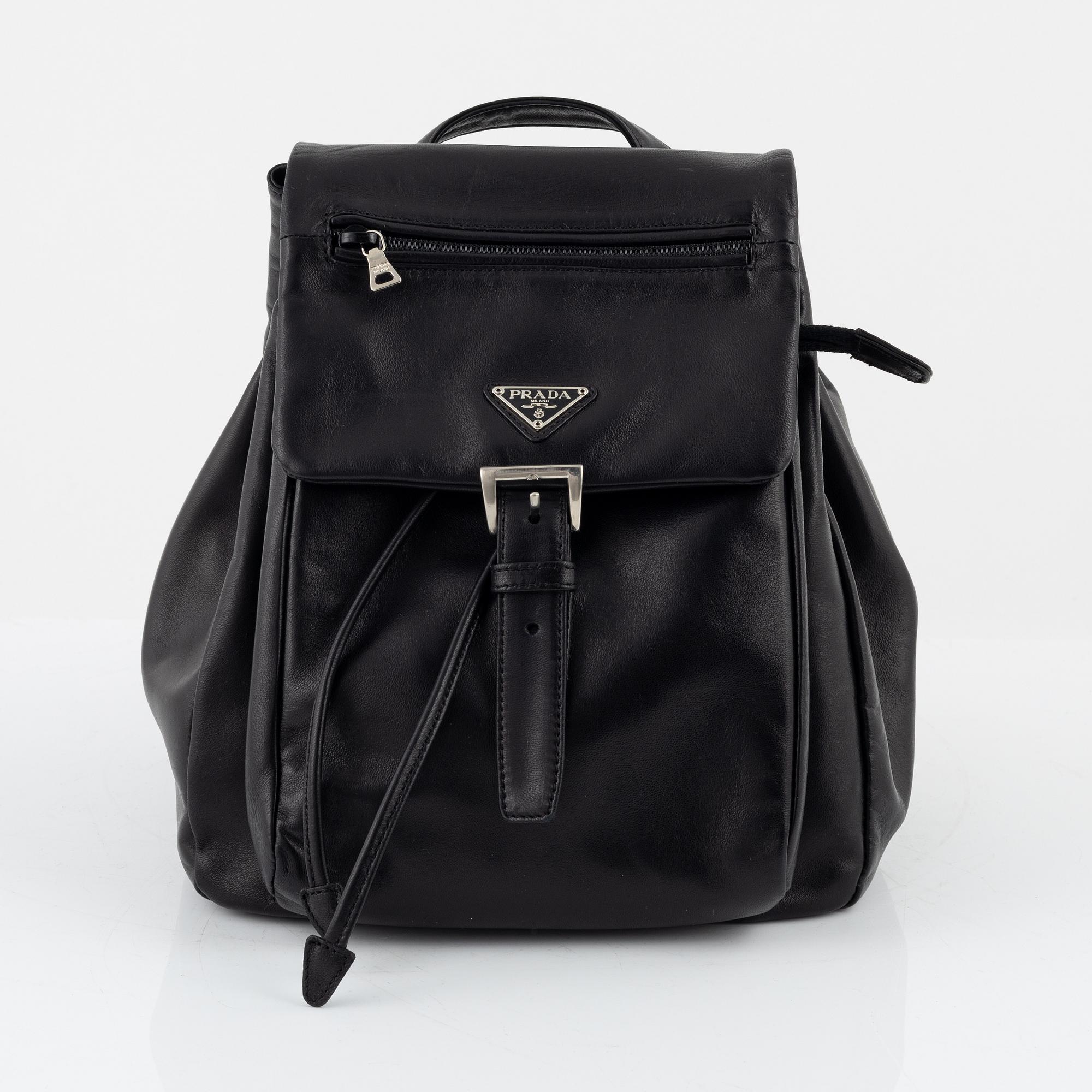 Prada, a leather backpack.