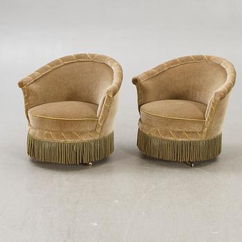 A pair of late 19th century easy chairs.